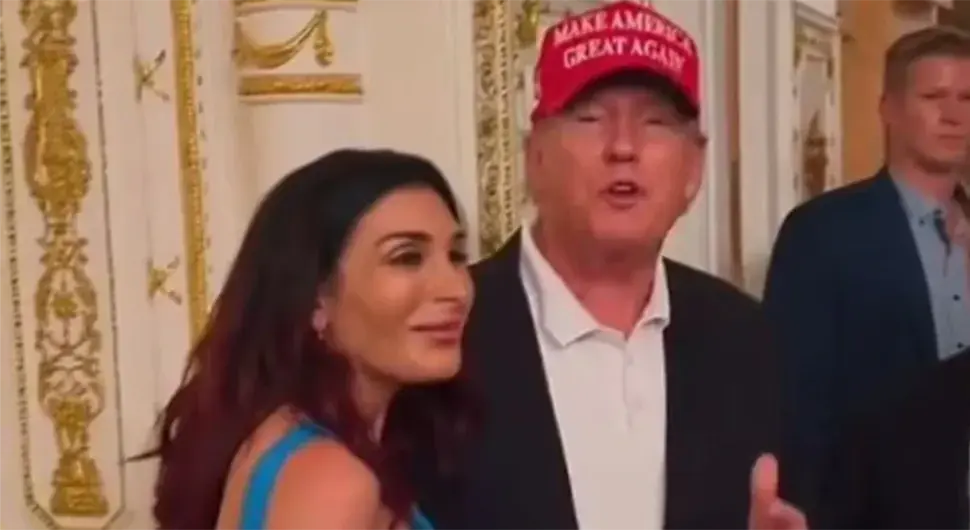 Лаура Лумер и Доналд Трамп